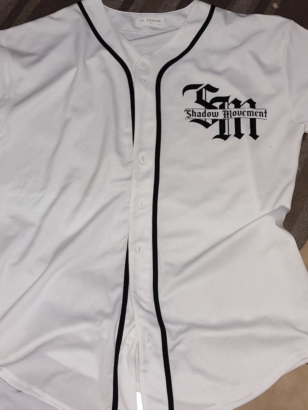 White Baseball Jersey with Black Trim - Shadow Movement Graphic